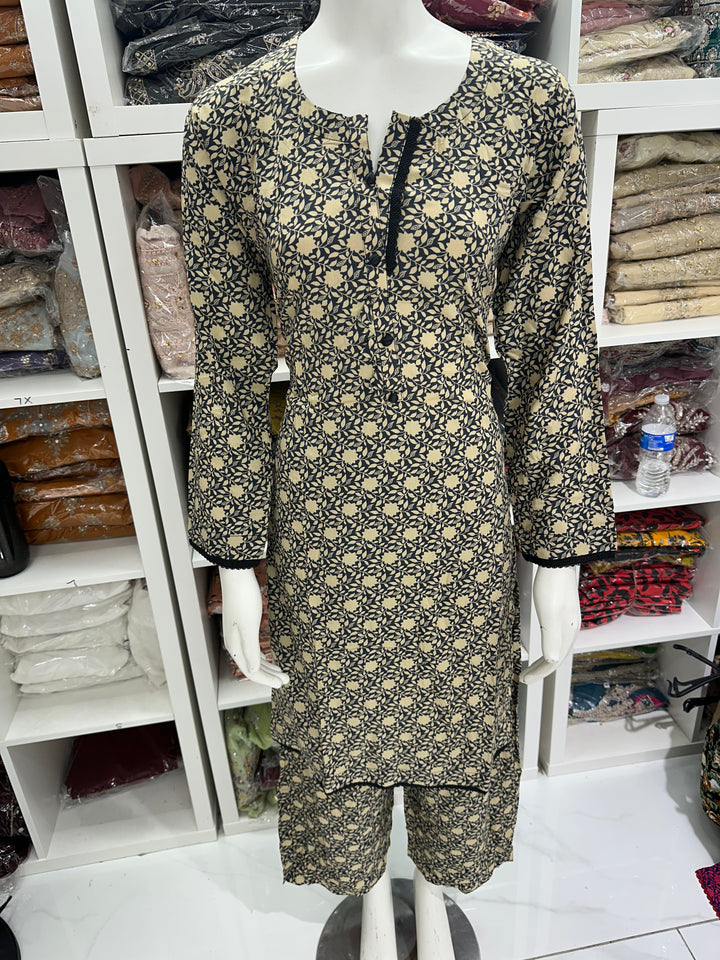 two piece linen material floral print suits on offer Ready to Wear