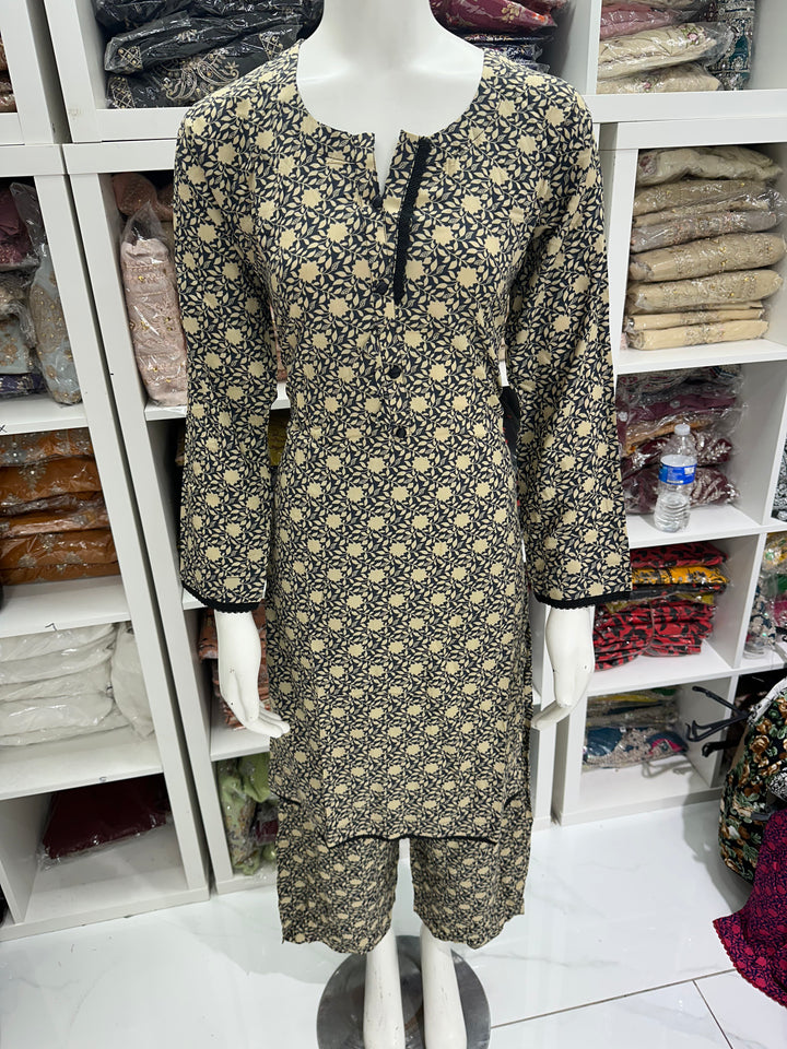 two piece linen material floral print suits on offer Ready to Wear