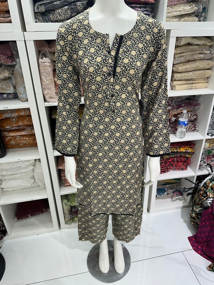 two piece linen material floral print suits on offer Ready to Wear