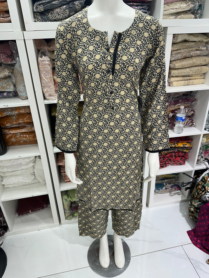 two piece linen material floral print suits on offer Ready to Wear