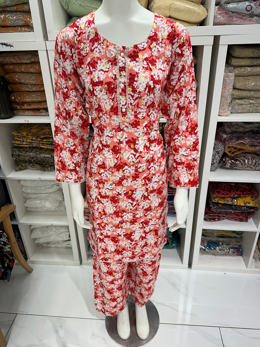 two piece linen material floral print suits on offer Ready to Wear