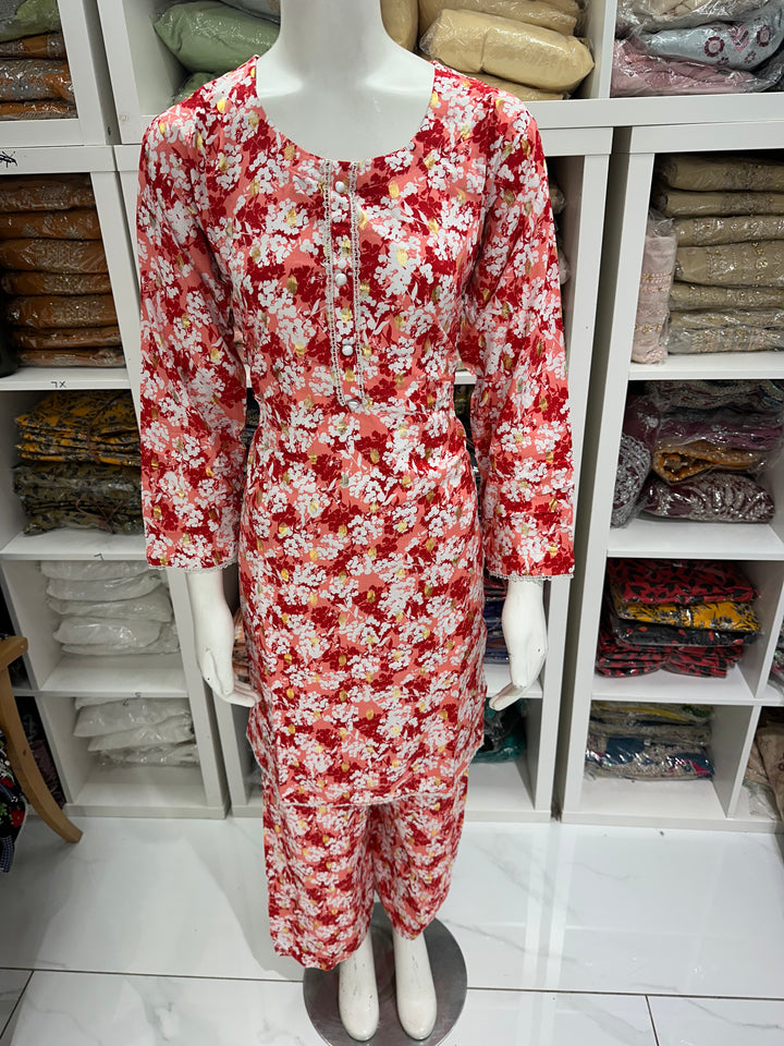 two piece linen material floral print suits on offer Ready to Wear