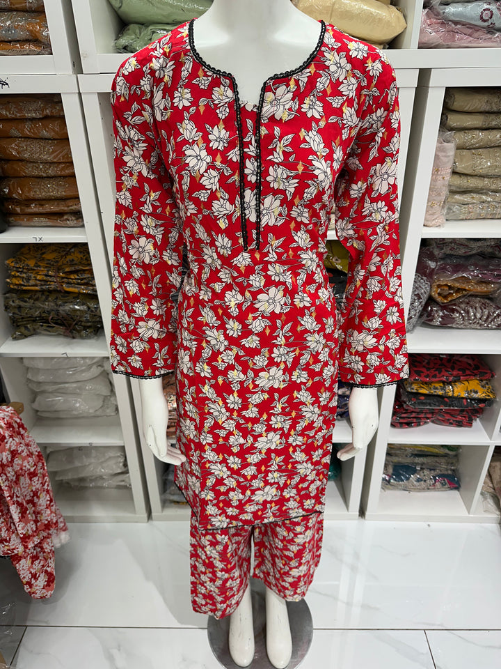 two piece linen material floral print suits on offer Ready to Wear