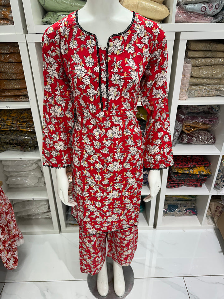 two piece linen material floral print suits on offer Ready to Wear