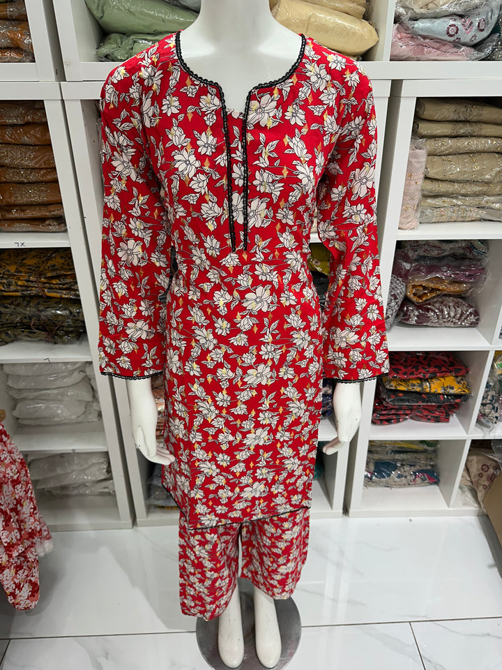 two piece linen material floral print suits on offer Ready to Wear