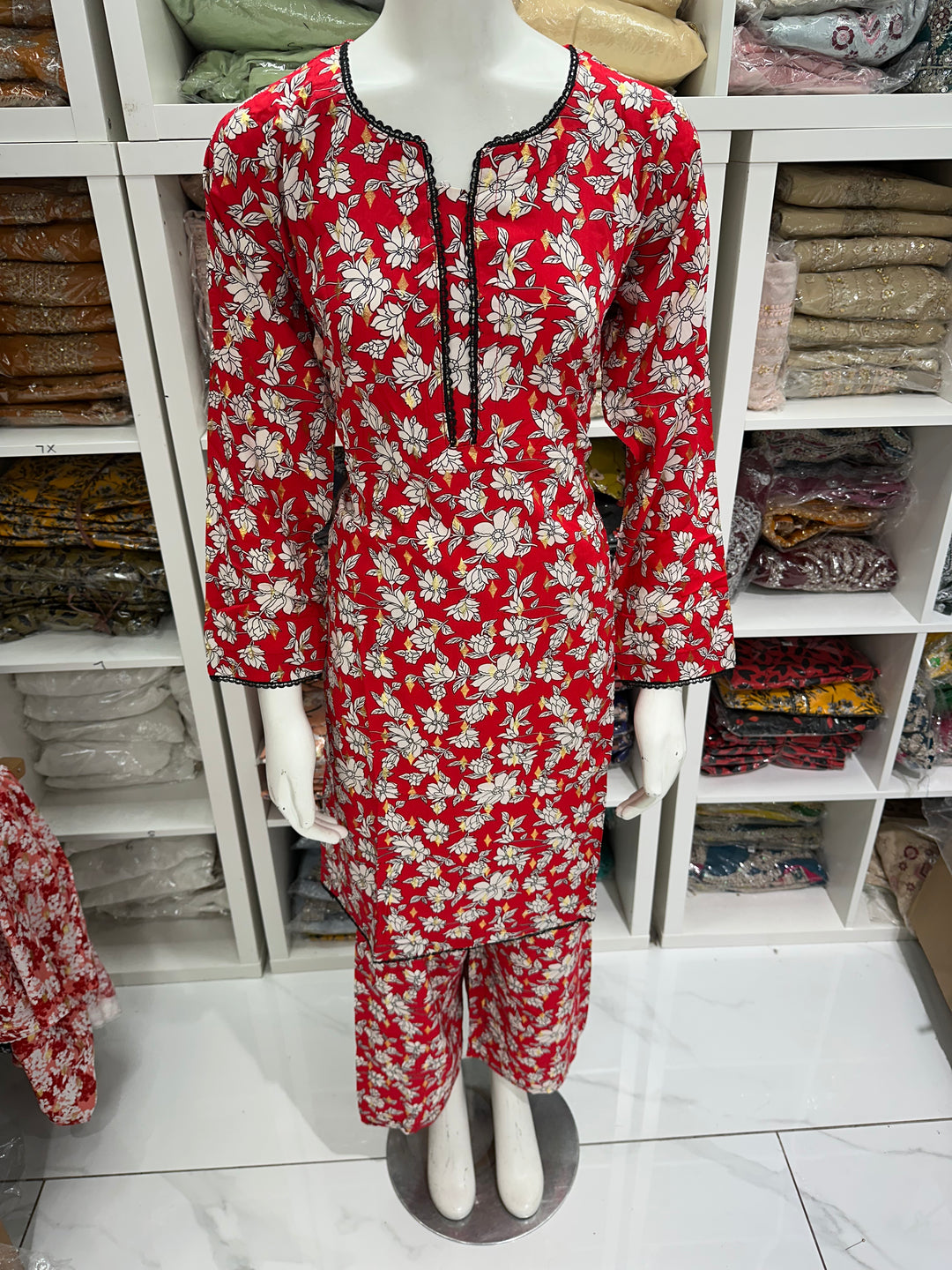 two piece linen material floral print suits on offer Ready to Wear