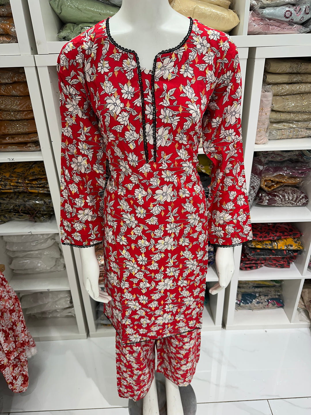 two piece linen material floral print suits on offer Ready to Wear