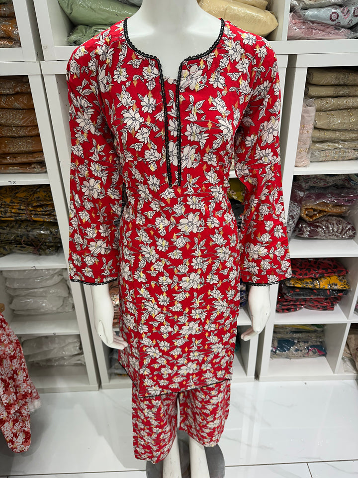 two piece linen material floral print suits on offer Ready to Wear