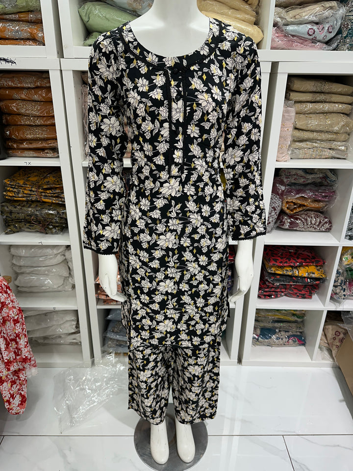 two piece linen material floral print suits on offer Ready to Wear