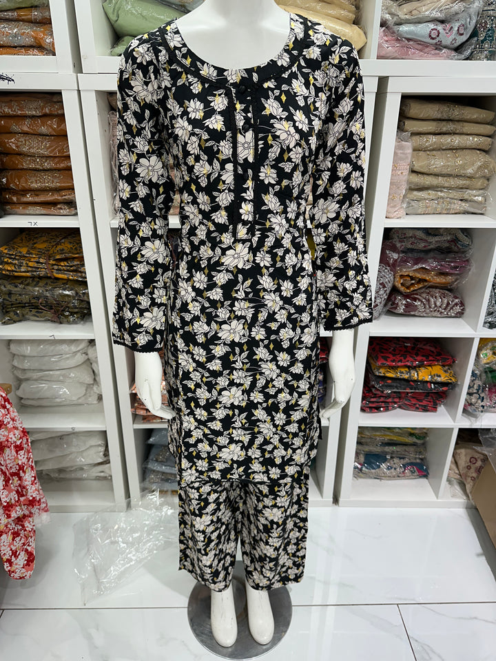 two piece linen material floral print suits on offer Ready to Wear