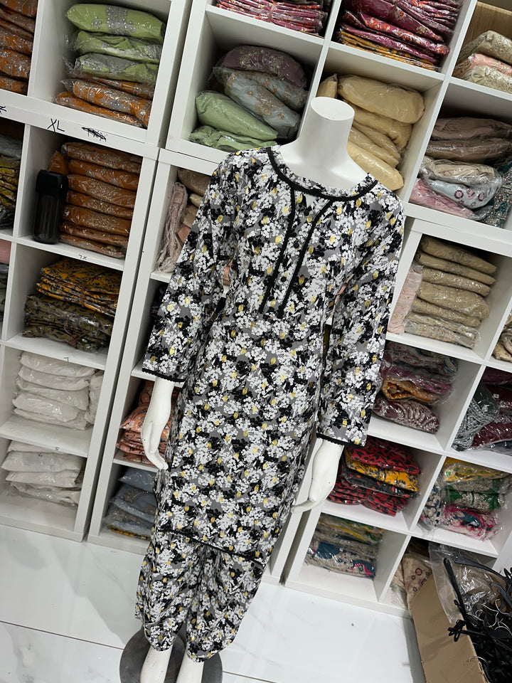two piece linen material floral print suits on offer Ready to Wear