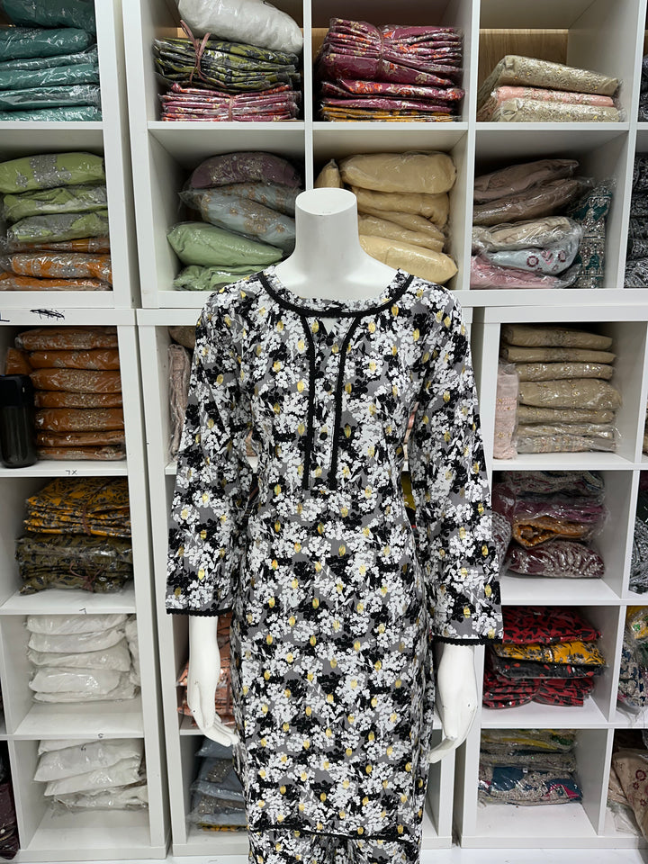 two piece linen material floral print suits on offer Ready to Wear