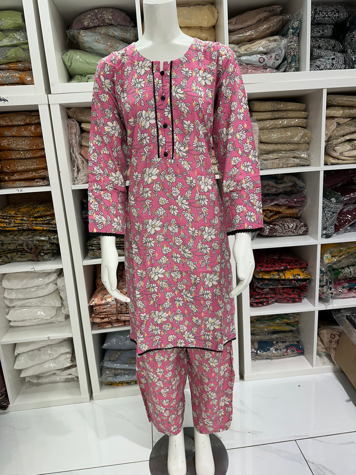 two piece linen material floral print suits on offer Ready to Wear